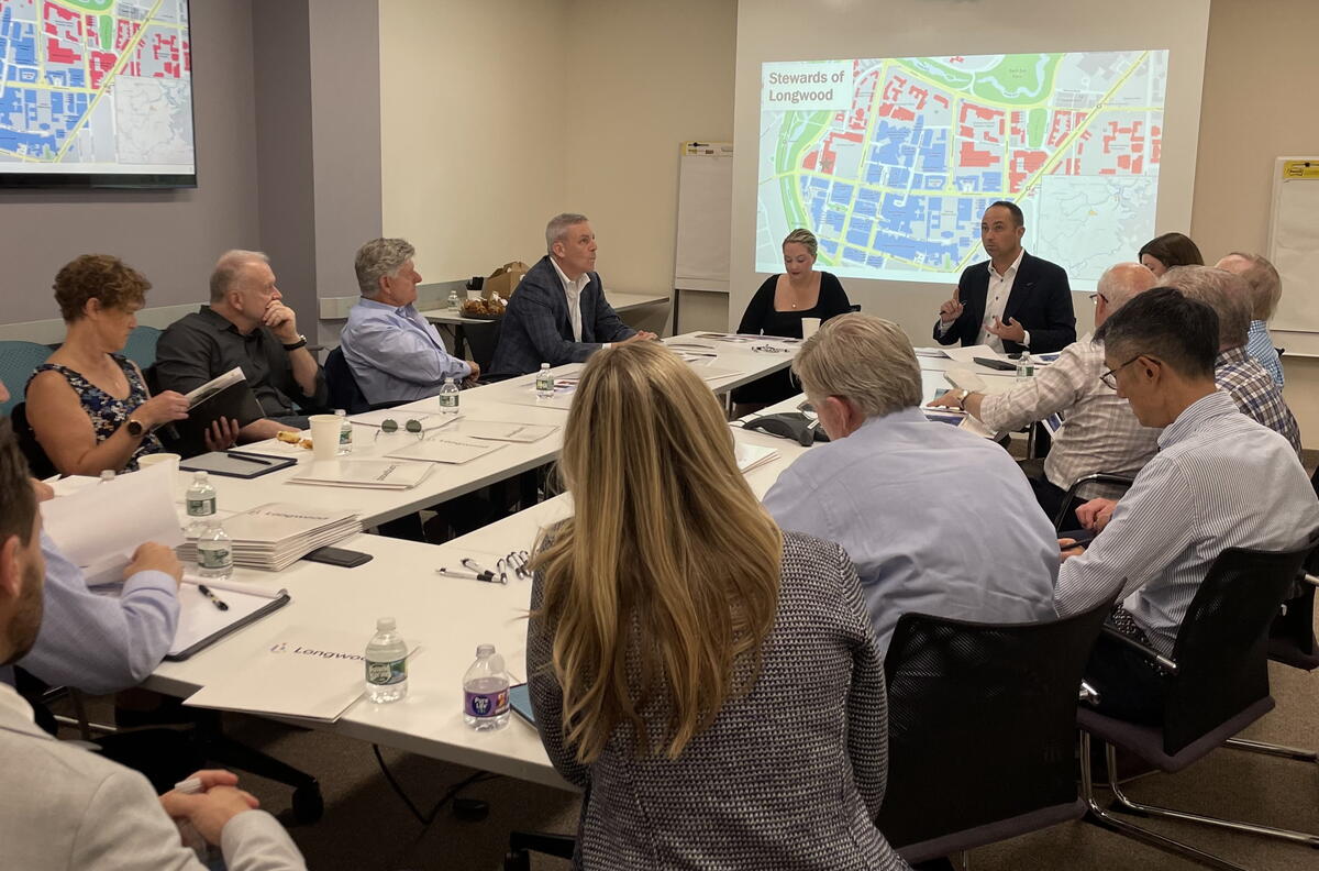 image of people around conference table