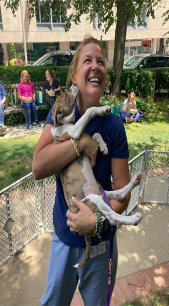 woman with puppy